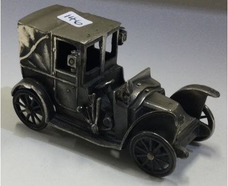 A rare Continental silver model of a Renault Taxi de la Marne car. Approx. 135 grams. Est. £120 - £150.