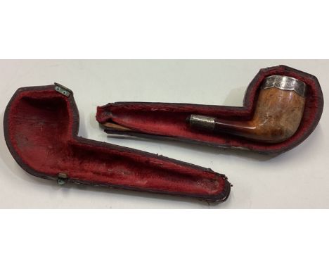 A cased 19th Century Victorian silver pipe. 1887. Approx. 18 grams. Est. £30 - £40.