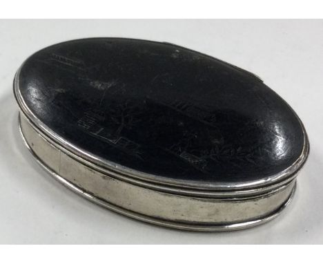 A rare 19th Century silver and carved tortoiseshell snuff box engraved with temples and birds. Approx. 34 grams. Est. £120 - 