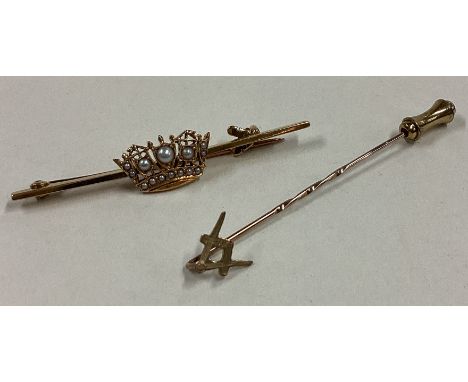 A small Masonic stick pin together with a gold brooch. Approx. 4 grams. Est. £50 - £80.