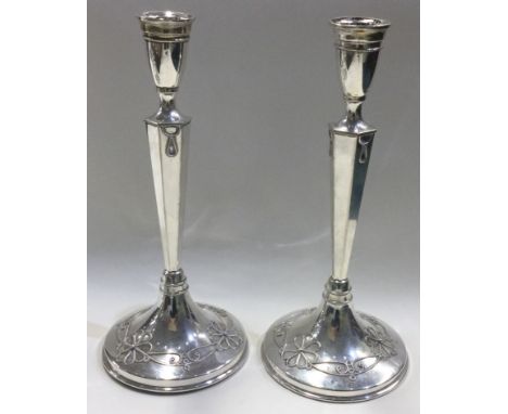 A rare pair of Victorian silver candlesticks realistically modelled with flowers. Sheffield 1839. By Henry Wilkinson & Co. Ap