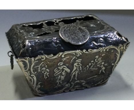 A 19th Century Dutch silver tea caddy with hinged lid and embossed decoration bearing import marks. Approx. 93 grams. Est. £8