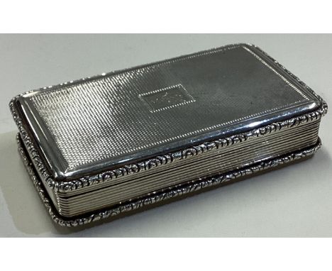 A large William IV silver engine turned snuff box. London 1830. By Edward Edwards. Approx. 122 grams. Est. £250 - £300.