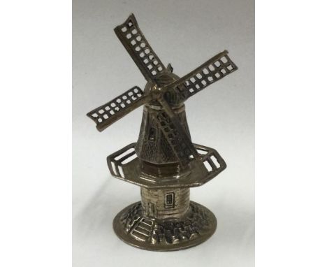 An Antique Dutch silver toy model of a windmill. Approx. 21 grams. Est. £30 - £40.