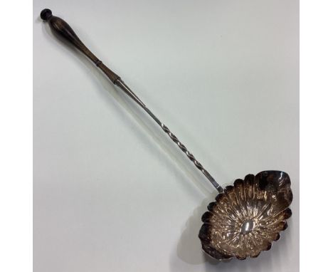 A rare large Continental silver toddy ladle. Maker's mark and other mark only. Approx. 46 grams. Est. £150 - £200.