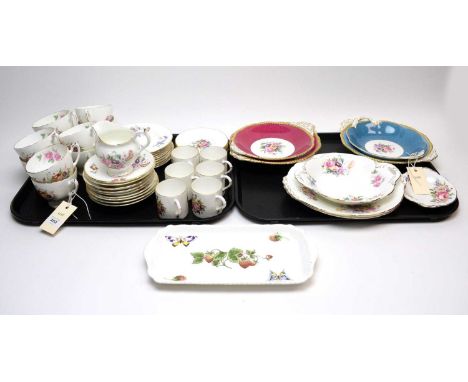 A Coalport ‘Junetime’ pattern part tea service, comprising nine tea trios, a cream jug, two sandwich plates and other plates;
