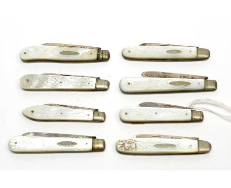 A collection of Victorian and later silver-bladed fruit knives, each with florally carved mother-of-pearl grip-scale handle, 