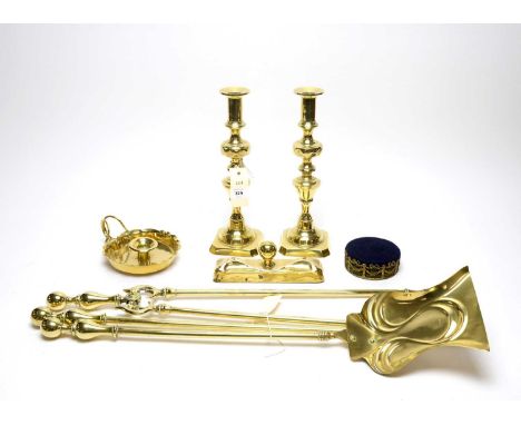 A collection of 19th Century and later brass ware, including: an Art Nouveau three-piece fire companion or fireside set; a pa