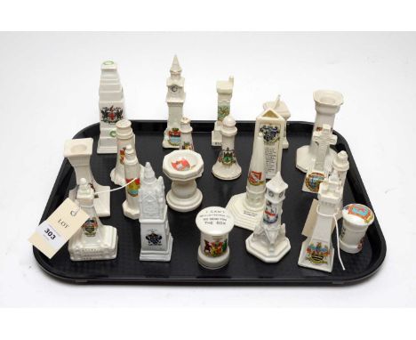 A collection of crested ceramic clock towers, obelisks, war monuments and other items, including: a Model of the Cenotaph ere