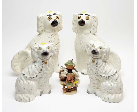 Two Victorian pairs of Staffordshire ceramic Wally/hearth dogs, the larger pair with beaded eyes, 34cms high; together with t