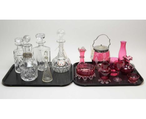 A collection of 19th Century cranberry glass ware, including: cranberry overlaid glass jar with fruiting vine decoration, whi
