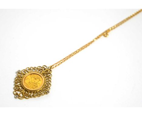 An Elizabeth II gold half sovereign, 1982, in 9ct gold mount set with small diamonds at compass points, on 9ct gold chain, 12