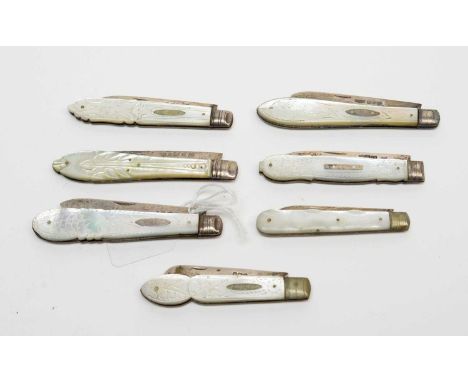 A collection of Victorian and later silver-bladed fruit knives, each with foliate carved mother-of-pearl grip-scale handle, b