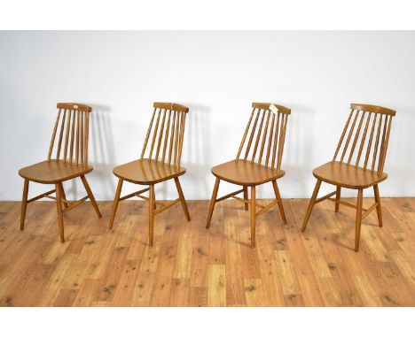 Manner of Farstrup: A set of four vintage beech and plywood dining chairs, each with spindle backrest and solid seat, raised 