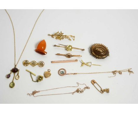 A gemstone necklace, set with garnet, peridot, citrine and amethyst on a gold trace link chain; a citrine set 9ct yellow gold
