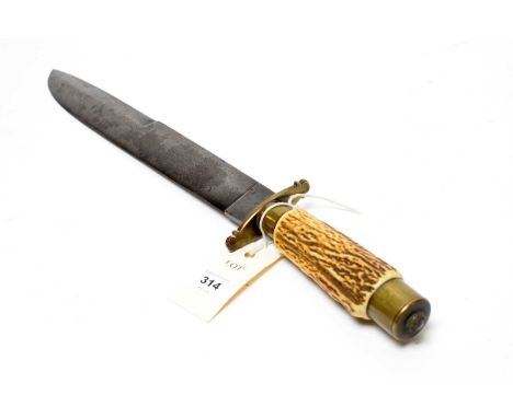 A German hunting knife, white metal blade, with brass mounts and horn grip handle, 46cms high.
