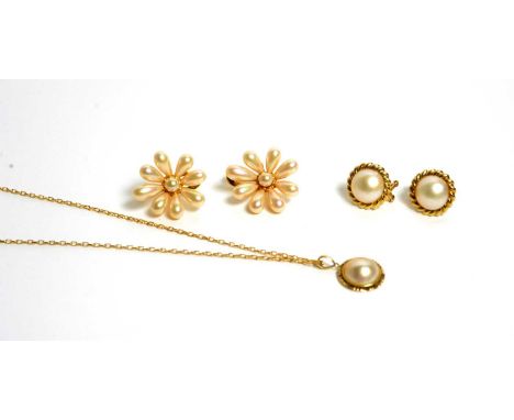 A mabe pearl pendant and earrings, in 9ct gold mounts, the pendant on 9ct gold chain, 11.3g gross; and a pair of silver gilt 