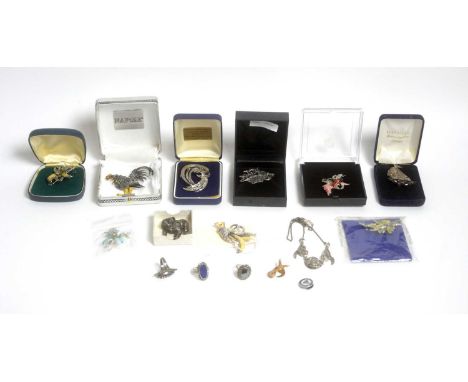 A collection of marcasite set jewellery, some set-in silver, some with enamel decoration, mostly brooches.
