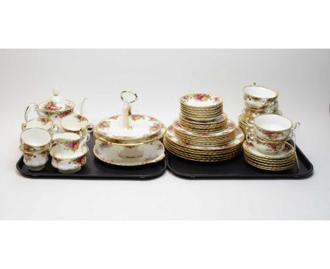 A Royal Albert ‘Old Country Roses’ pattern tea and dinner service, including: six place settings; a teapot; a cake stand; tri