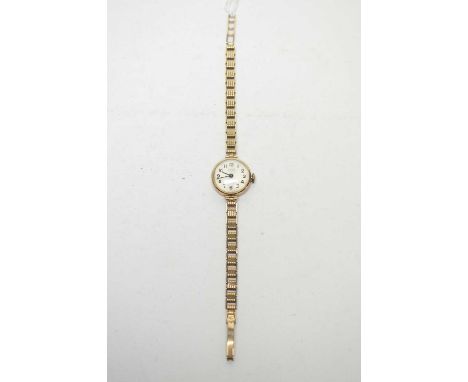 A 9ct yellow gold cocktail watch by Avia, with manual wind movement and gold link bracelet, 15.8g gross.