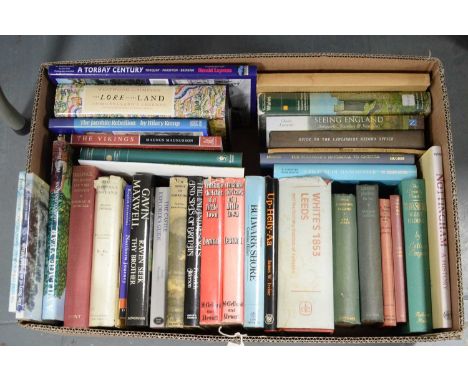 A selection of hardback books, primarily relating to Britain, titles including: The Lore of the Land: A Guide to England's Le
