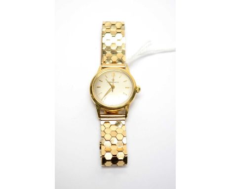 An 18ct gold cased Eterna-Matic automatic wristwatch, on 9ct gold hexagonal link strap, 58.8g gross.