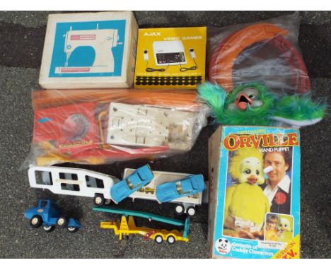 Meccano  and Tonka - a selection of children's toys comprising Meccano Lock Stitch sewing machine, Ajax video console, Keith 