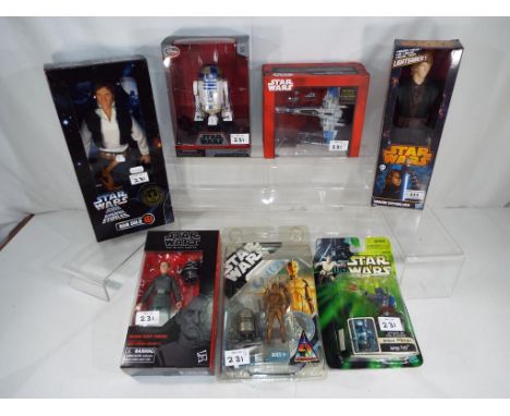 Star Wars - a mixed lot of Star Wars collectables to include Hans Solo from the Collectors Series, a Light Sabre in the form 