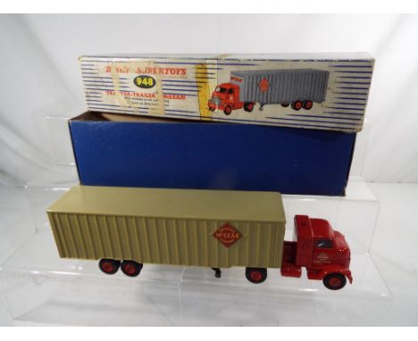 Dinky Super Toys - a diecast model Tractor - Trailer McLean, red cab with light grey trailer, red plastic hubs, with both rea