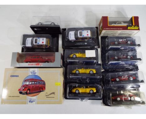 Corgi, Solido and others - Thirteen 1:43 scale diecast vehicles in original boxes. Boxes are G to NM, models NM to M