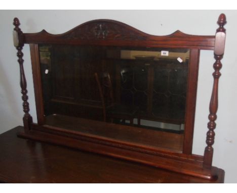 An Old Charm Overmantel Mirror with decorative surround and bevelled plate. 4ft 6ins wide, height 31.25ins.