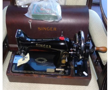 A Vintage Cased Singer Sewing Machine.