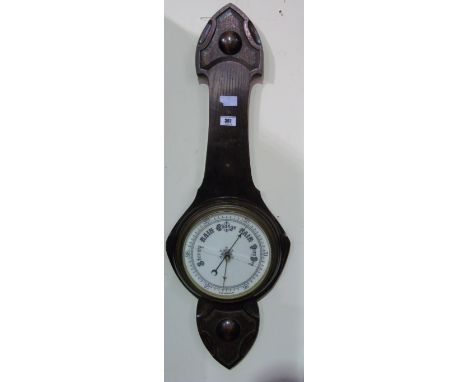 An Oak cased Barometer.