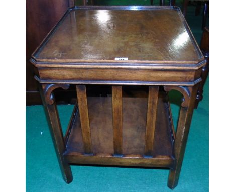 A Low 20th Century Side Table; with a tray top and a lower tier shelf, H 22" W 21" D 19".