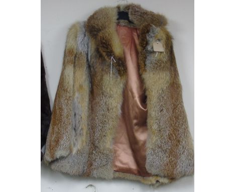 A Ladies Light Mink Fur Coat, half length.