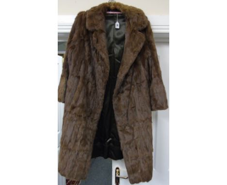 A Vintage Ladies' Fur Coat, full length, brown, with collar, swing shape, side pockets, satin lined (size UK 14/16).