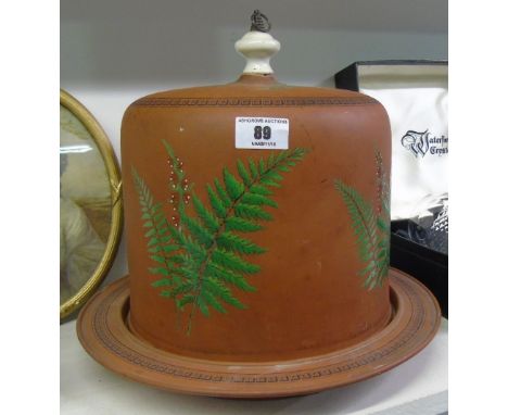 A Wonderful 19th Century Terracotta Cheese Dish and Bell Cover with ceramic finial, hand painted fern decoration..