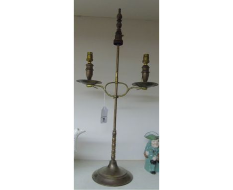 A Rise & Fall Two-Branch Desk Lamp (needs wiring).
