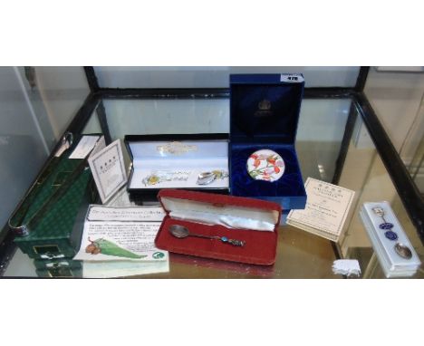 A Quantity of Items, to include an Australian Silver opal set spoon, a boxed Gucci ice tongs and other spoons.