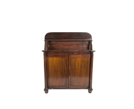 AN EARLY VICTORIAN MAHOGANY CHIFFONIER SIDECABINET, with raised panel back and shelf above twin panel doors flanked by turned