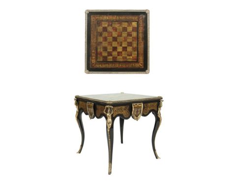 A VICTORIAN STYLE LOUIS XIV EBONY AND FAUX BOULLE SQUARE TOP GAMES TABLE, the top with inlaid chess board within an arabesque