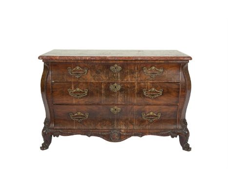 A 19TH CENTURY CONTINENTAL FRUITWOOD BOMBÉ COMMODE, the red veined marble top raised above three long drawers with cast brass