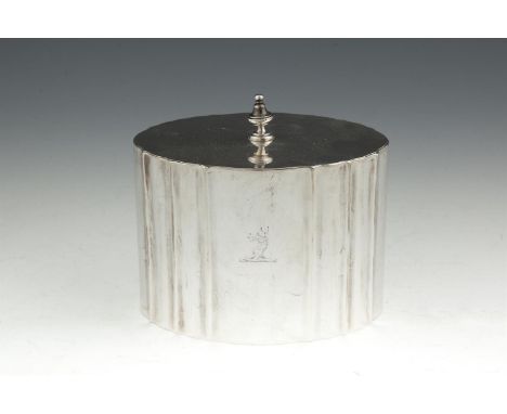  A VICTORIAN SILVER TEA CADDY, London 1863, mark of Alexander Smith, of oval panelled form, the flat hinged lid with bell fin