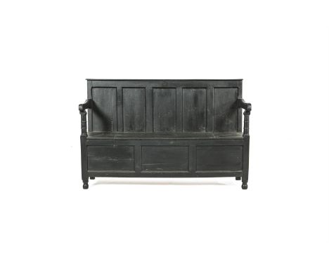 A DARK STAINED OAK BENCH, 18TH CENTURY,with quintuple panelled back, on a box base with triple panelled frieze, on short turn