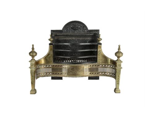 A GEORGE III BRASS AND CAST IRON FIRE GRATE, of serpentine form, with engraved pierced brass grill and flanked by tapering up