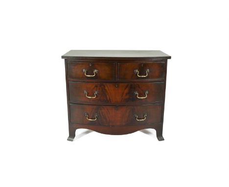 A SMALL 19TH CENTURY MAHOGANY BOWFRONT CHEST, of two short drawers and two long drawers, with brass drop handles, raised on b