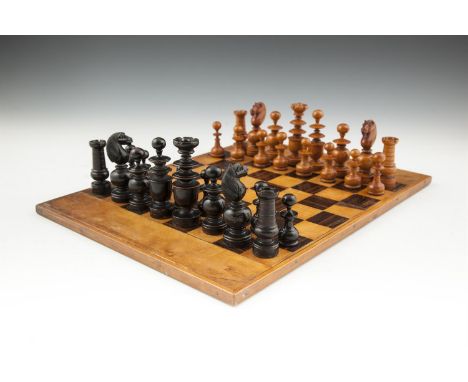 A FRENCH EBON AND OLIVEWOOD 'RÉGENCE' PATTERN CHESS SET, late 19th Cenutry, the Kings approximately 9.5cm high, along with a 