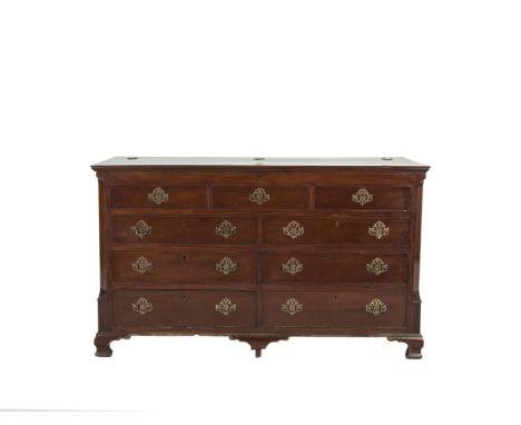 A LARGE GEORGIAN STYLE MAHOGANY RECTANGULAR CHEST, the hinged top above five false drawers and four long drawers with brass d