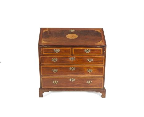 A LATE GEORGE III INLAID MAHOGANY SLOPE FRONT BUREAU, the crossbanded top above a drop front writing section, well fitted wit