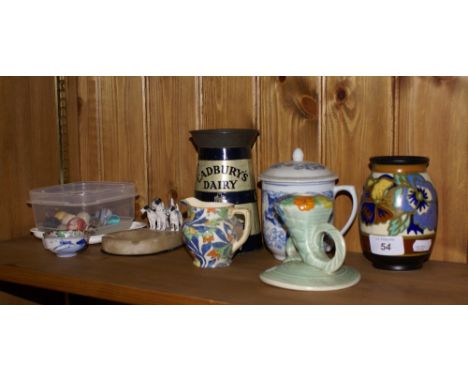 Gouda pottery vase, Carlton Ware candle stick, Oriental blue and white cup and cover, Cadbury's Chocolate tin money box, asht